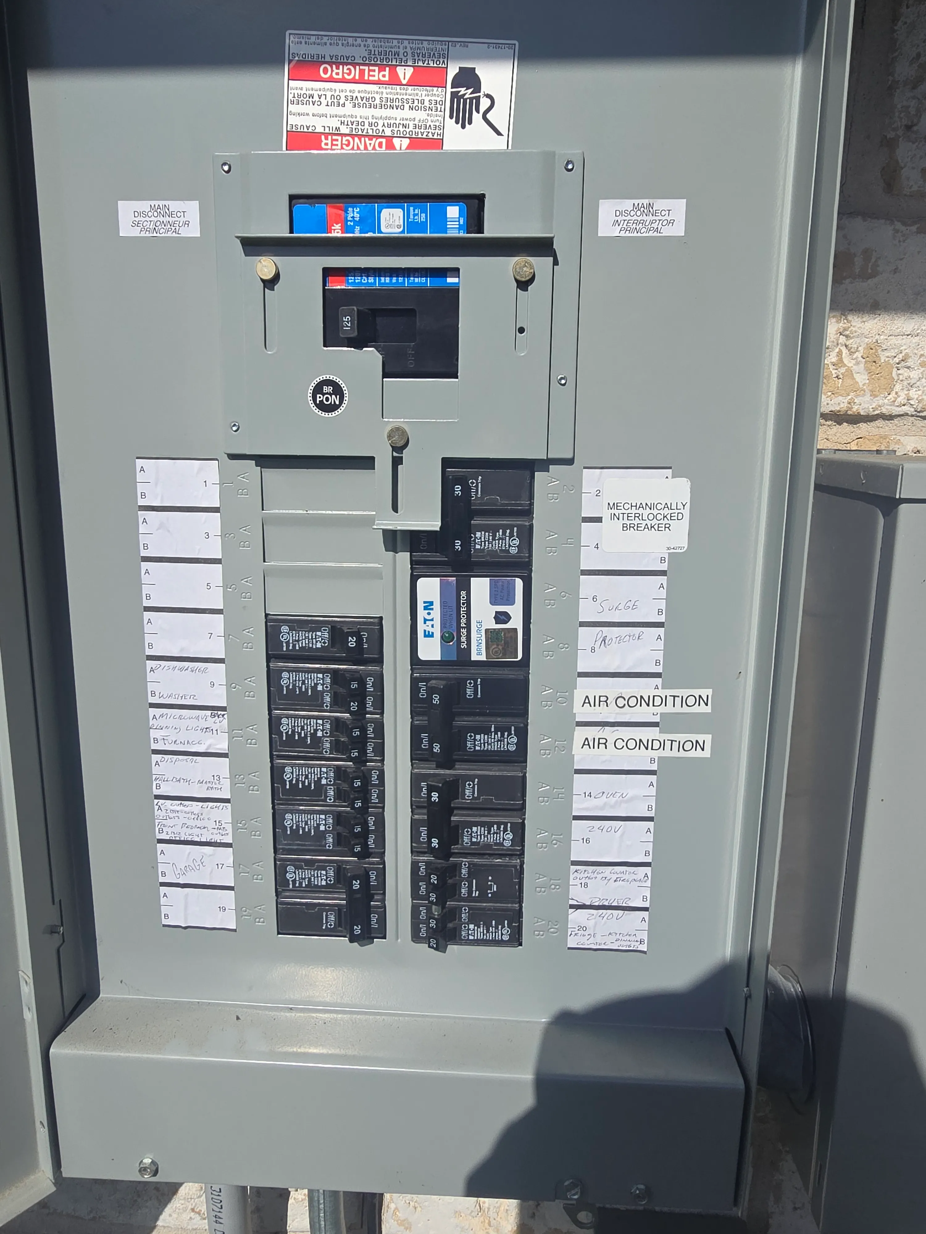 Clearly labeled residential electrical panel with organized circuits and surge protection