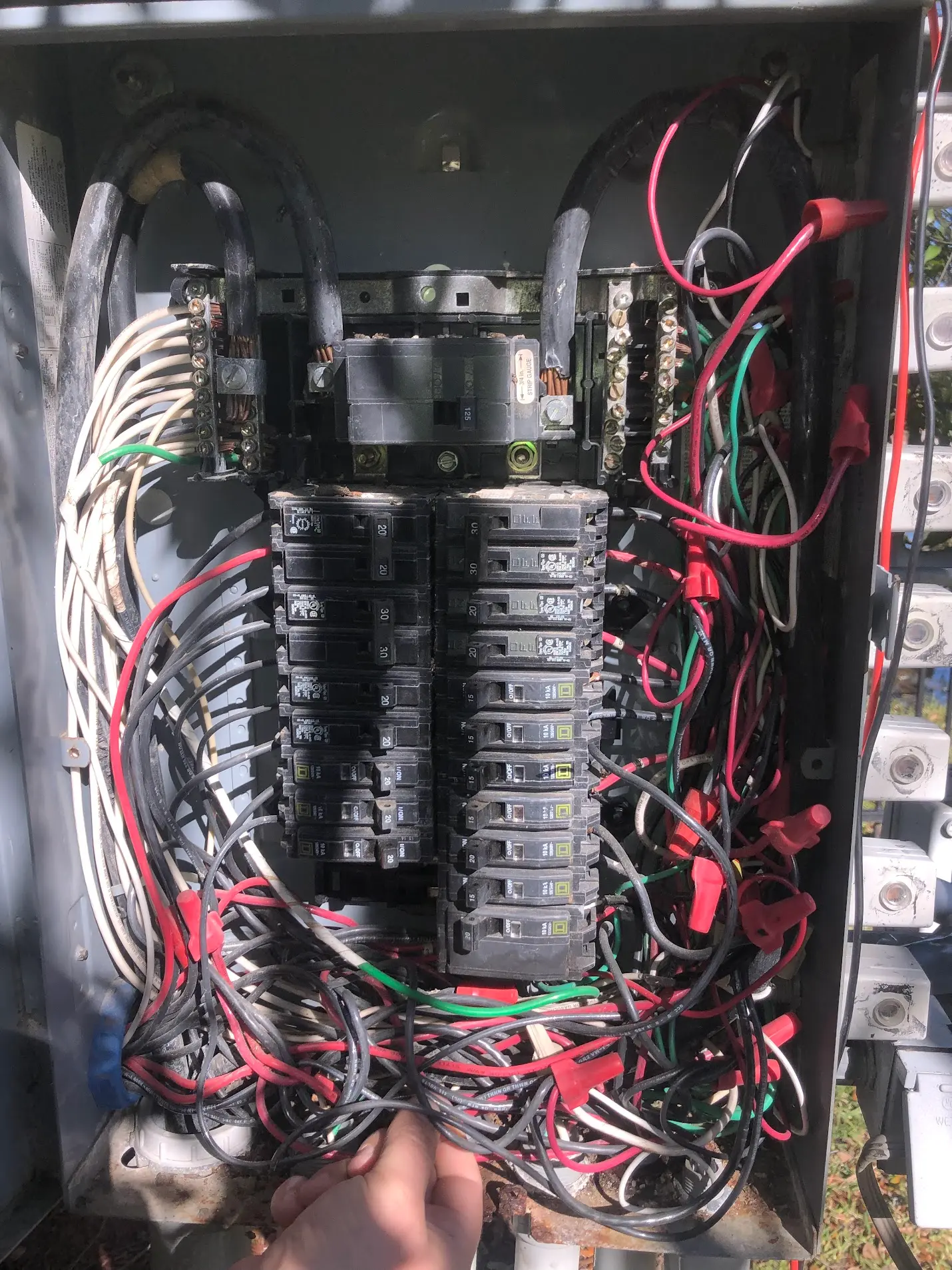 Crowded electrical panel wiring that complicates circuit tracing and future service